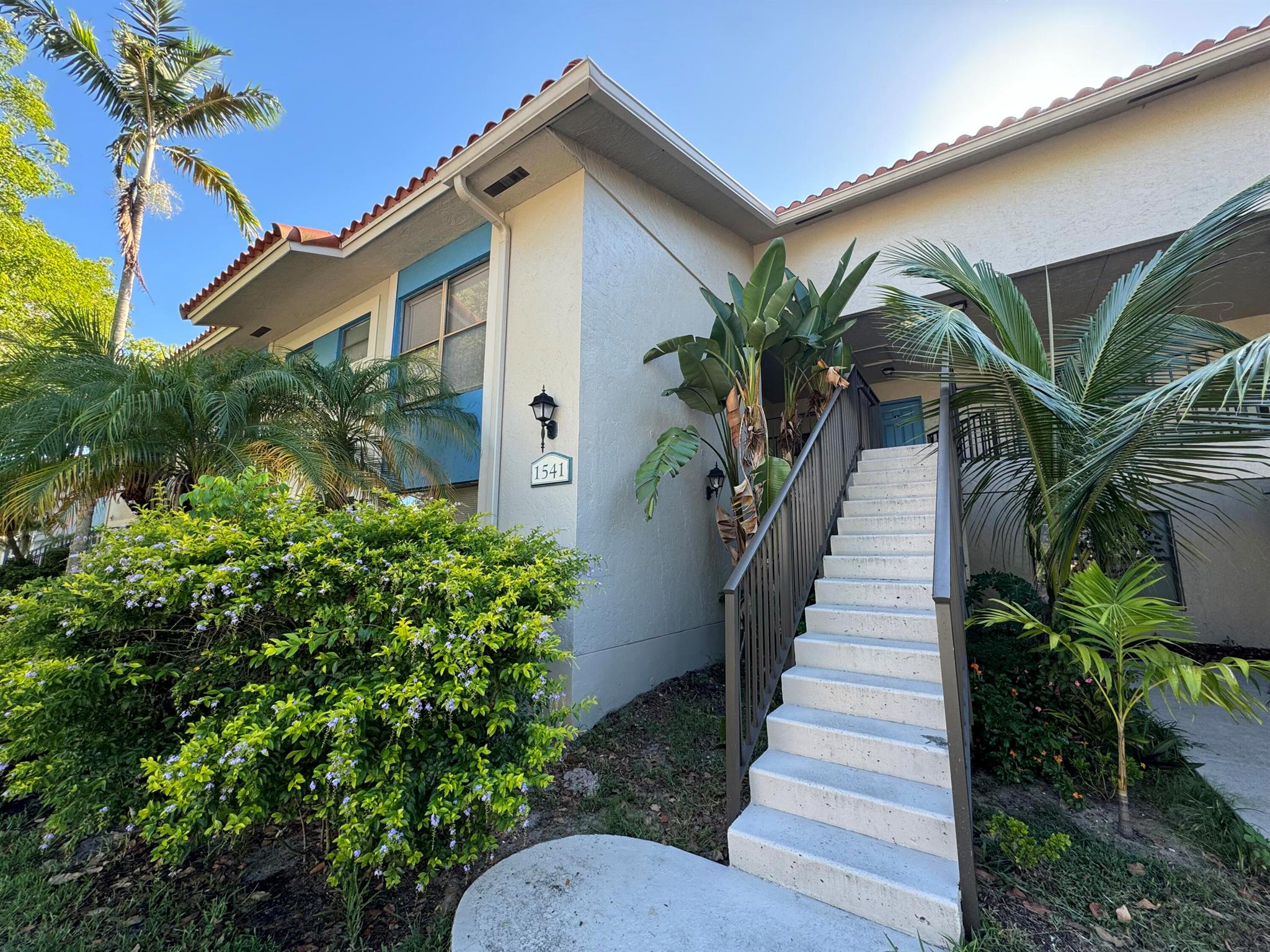 Come see this beautifully upgraded 2 bedroom, 2 bathroom condo in the heart of West Palm Beach! Located on the 2nd floor, this bright and airy unit features granite countertops, stainless steel appliances, tile flooring in the main living areas, and laminate wood floors in the bedrooms. Enjoy your morning coffee on the balcony overlooking a peaceful garden view, with partial lake views from both bedrooms. The unit includes central air, a full-size washer and dryer, and ample parking for residents and guests.This well-maintained community offers resort-style amenities, including a sparkling pool, tennis courts, and lush landscaping throughout. Zoned for Royal Palm Beach High School, and just minutes from shopping, dining, and entertainment at the Mall at Wellington Green and