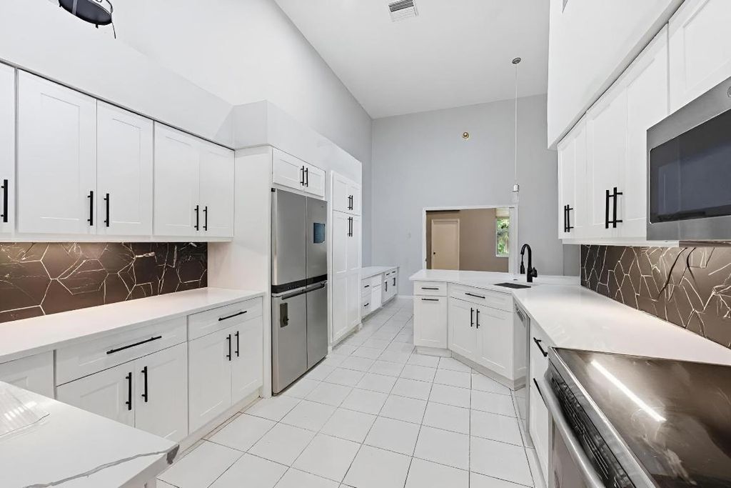 Photo of 2495 NW 66th Drive, Boca Raton, FL 33496 (MLS # R11143061)