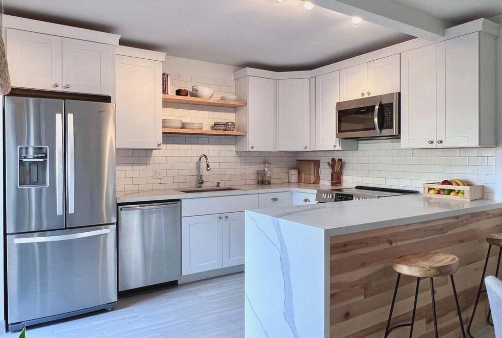 Photo of 3187 Gardens East Drive #D, Palm Beach Gardens, FL 33410 (MLS # R10929094)