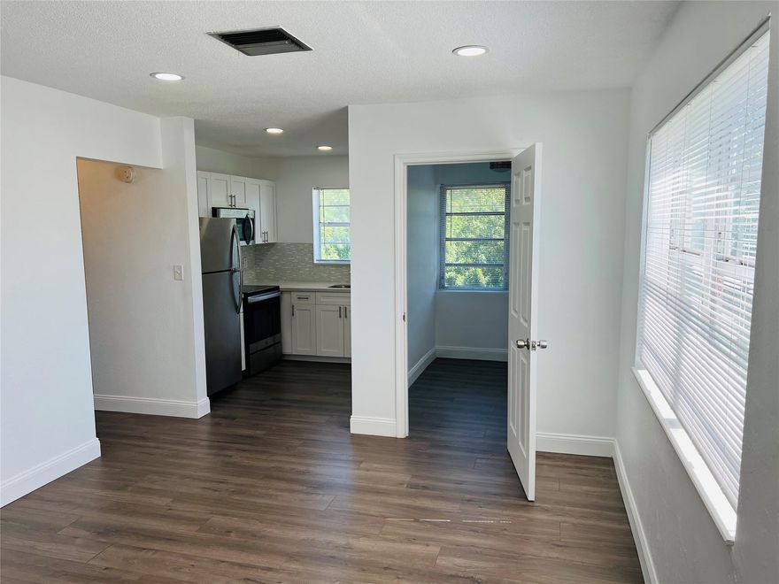 Updated corner condo unit: 1 bedroom/1 bathroom + office. EAST of US1. Close to the BEACH and broadwalk, shops, dinning, Westlake village park, major highways and AIRPORT. The unit has wood-looking vinyl floors throughout. Walk-in closet in the bedroom. Community pool, gym, clubhouse, and laundry facility on site. One assigned parking space. RENT INCLUDES WATER AND TRASH REMOVAL. Quiet 2 stories building.