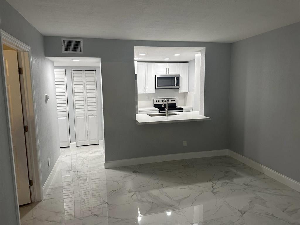 Photo of 9430 Boca Cove Circle #203, Boca Raton, FL 33428 (MLS # F10544704)