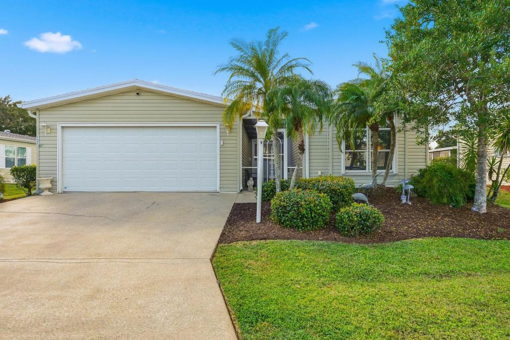Photo of 8121 9th Hole Drive, Port Saint Lucie, FL 34952 (MLS # R11152410)