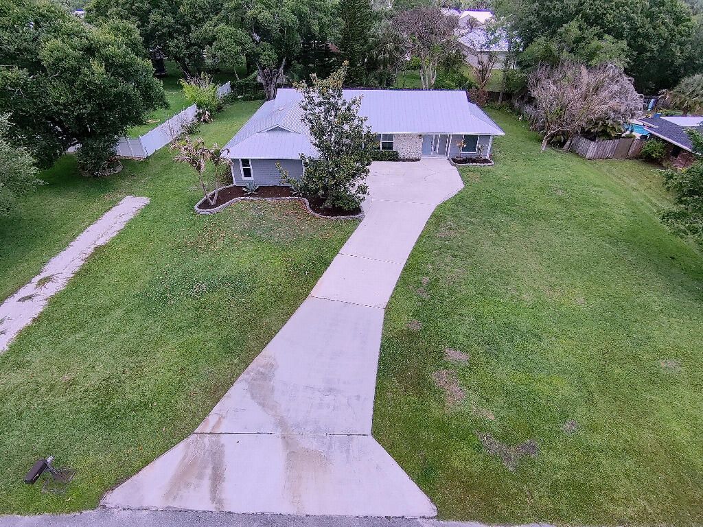 Photo of 2402 River Hammock Lane, Fort Pierce, FL 34981 (MLS # B26020740)