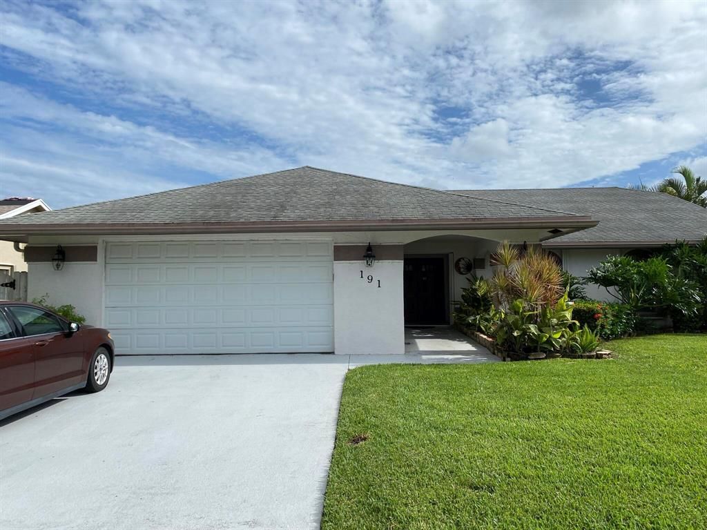 Photo of 191 Parkwood Drive, Royal Palm Beach, FL 33411 (MLS # R10737053)