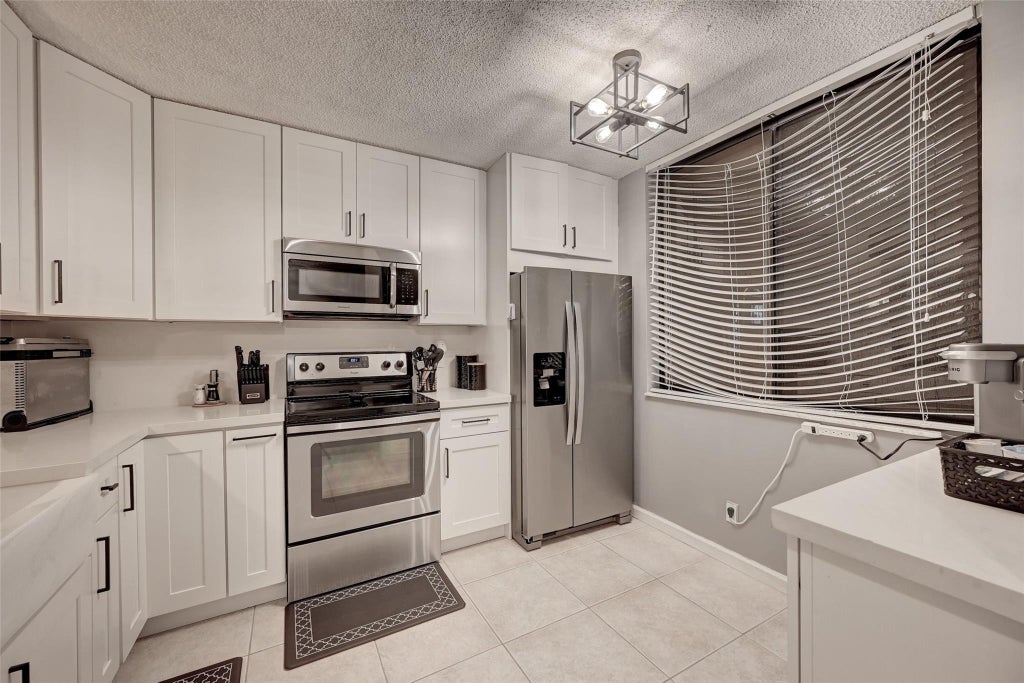Photo of 8592 W Sunrise Boulevard #Unit 206, Plantation, FL 33322 (MLS # B26077172)