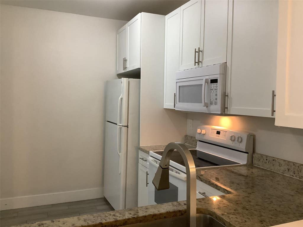 Photo of 1161 GOLDEN LAKES Boulevard #1316, West Palm Beach, FL 33411 (MLS # B26068722)