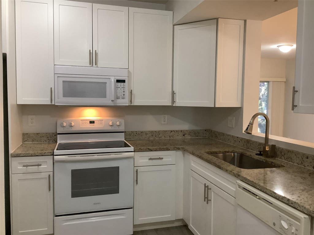 Photo of 1161 GOLDEN LAKES Boulevard #1316, West Palm Beach, FL 33411 (MLS # B26068722)