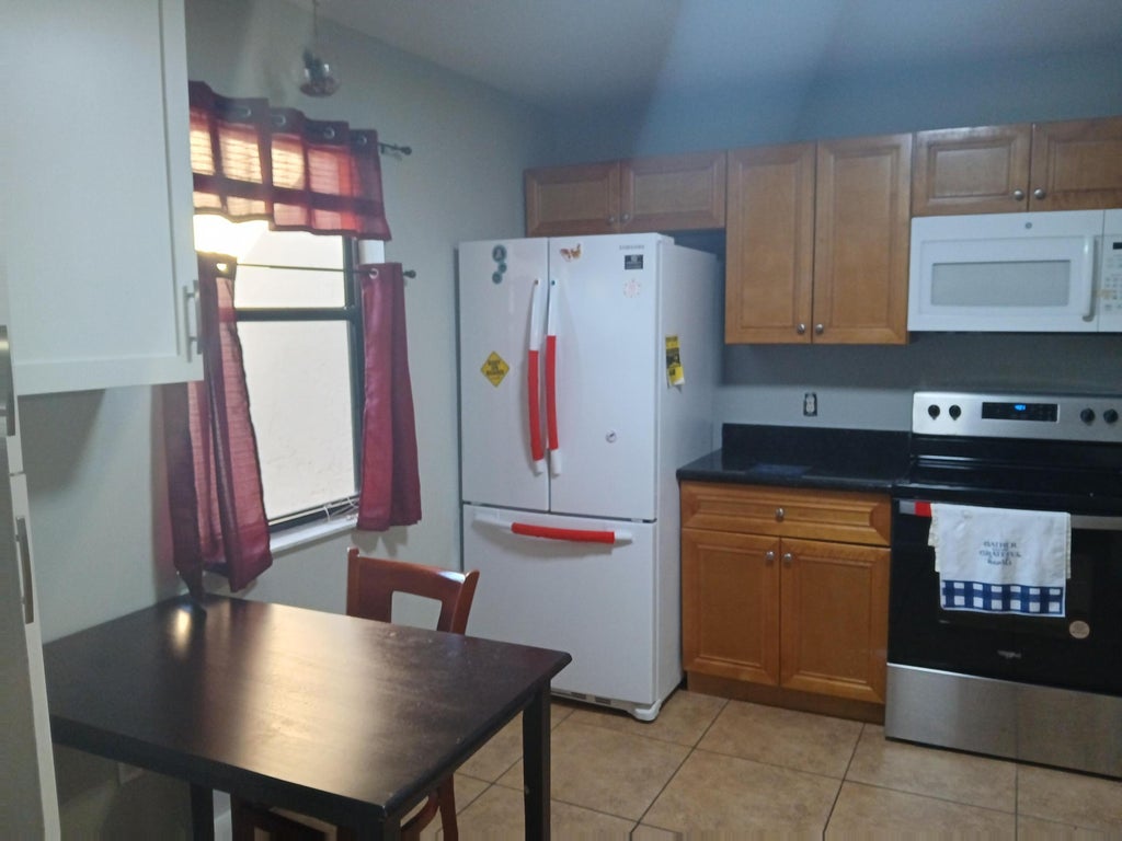 Photo of 1108 Lakeview Drive E, Royal Palm Beach, FL 33411 (MLS # B26064970)