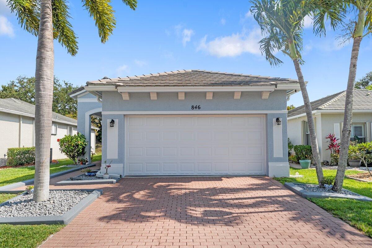 EASY LIVING IN THE GATED COMMUNITY OF LAKE FOREST WITH LOW HOA THAT INCLUDES FULL LAWN CARE, CABLE AND INTERNET. THIS UPGRADED 2 BED 2 BATH EXTENDED 2 CAR GARAGE. HAS A LIST OF UPDATES THAT INCLUDE NEW GRANITE COUNTERTOPS IN KITCHEN, NEWER SS APPLIANCES. NEW BATHROOM VANITIES IN BOTH BATHS, NEW GLASS SHOWER DOOR, HOUSE PAINTED INSIDE AND OUT. NEW GUTTERS AND LANDSCAPE CURBING. NEW AC 7/2023, NEW WASHER AND DRYER, BACKYARD HAS COVERED EXTENDED PAVER PATIO OUT BACK WITH PRIVATE GARDEN VIEWS. ALL AT THIS PRICE AND YOU ALSO GET TO ENJOY THE 2 POOLS, CLUBHOUSE AND FITNESS CENTER IN THE HEART OF ST LUCIE WEST. CALL FOR A PRIVATE SHOWING. CAN BE RENTED IMMEDIATLY PERFECT FOR A 1031 EXCHANGES.. No breed restrictions on pets.