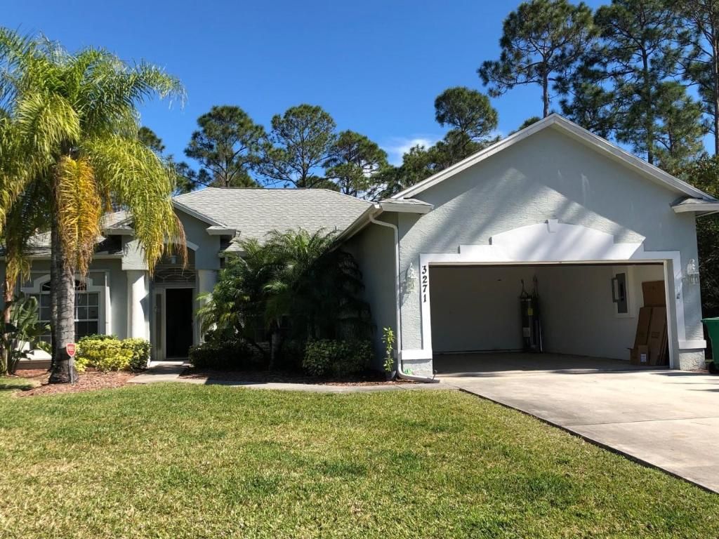 Photo of 3271 SW Fillmore Street, Port Saint Lucie, FL 34953 (MLS # R11086733)