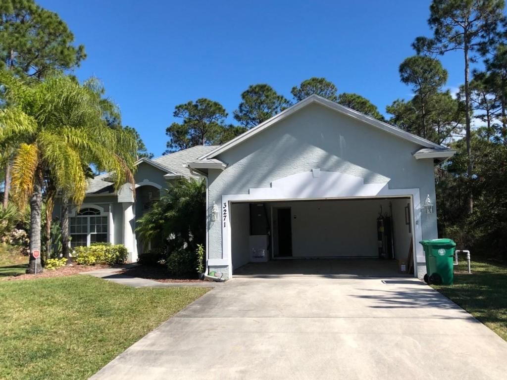 Photo of 3271 SW Fillmore Street, Port Saint Lucie, FL 34953 (MLS # R11086733)