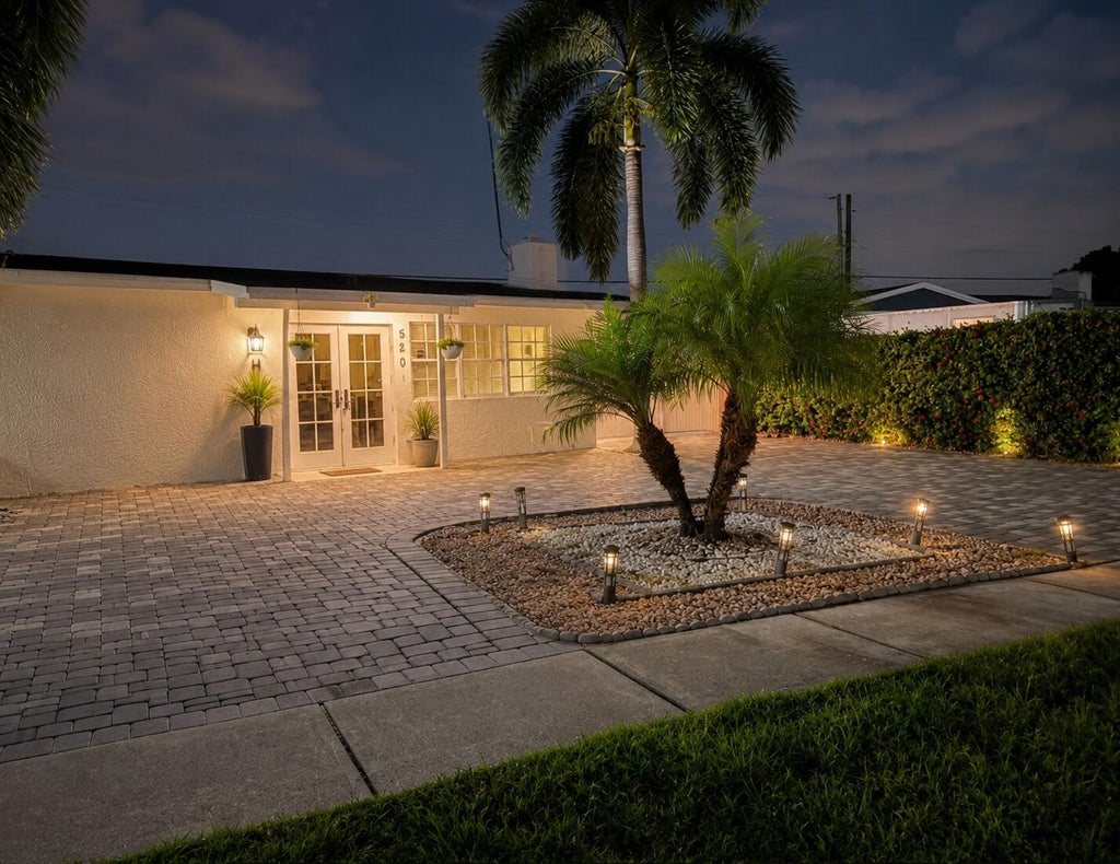 Photo of 520 CHERRY Road, West Palm Beach, FL 33409 (MLS # B26076558)