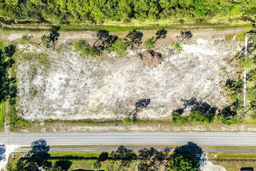 Photo of 7160 Mellen Lane N, Jupiter, FL 33478 (MLS # R11073836)