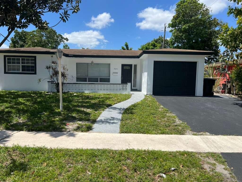 Photo of 3631 NW 33rd Avenue, Lauderdale Lakes, FL 33309 (MLS # B26014843)