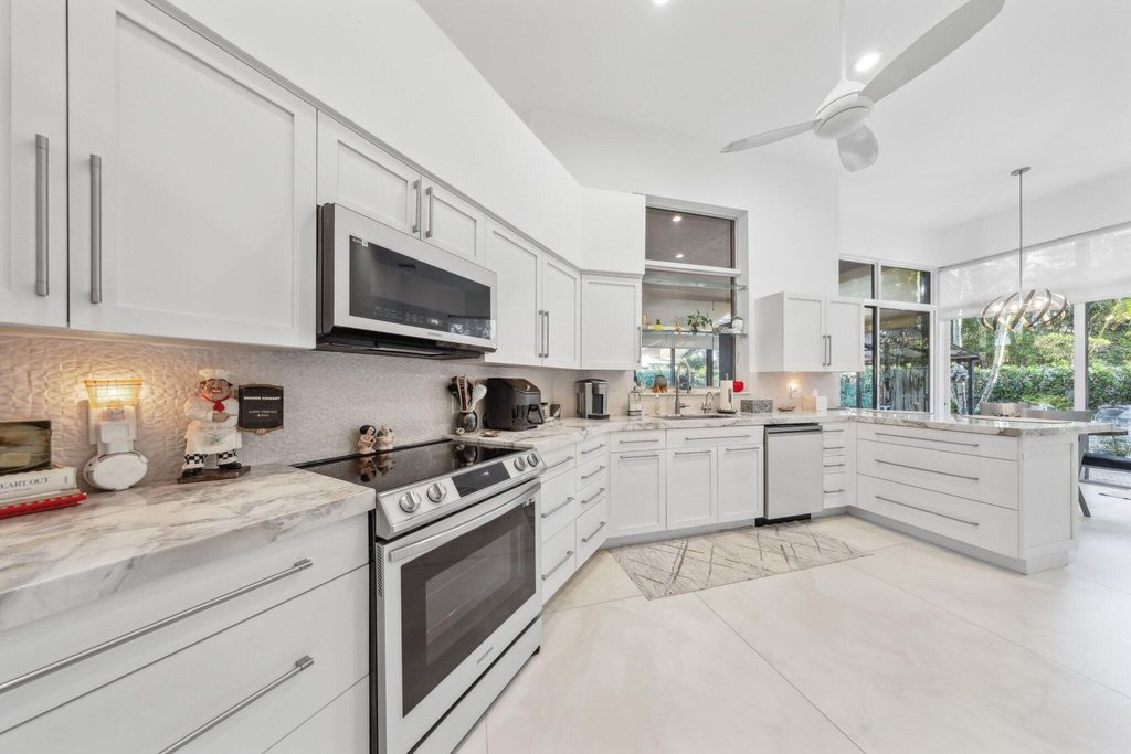 Photo of 2444 NW 63rd Street, Boca Raton, FL 33496 (MLS # R11041625)