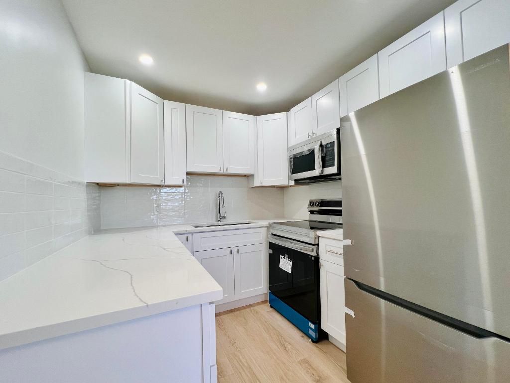 Photo of 130 Chatham F, West Palm Beach, FL 33417 (MLS # R11155419)