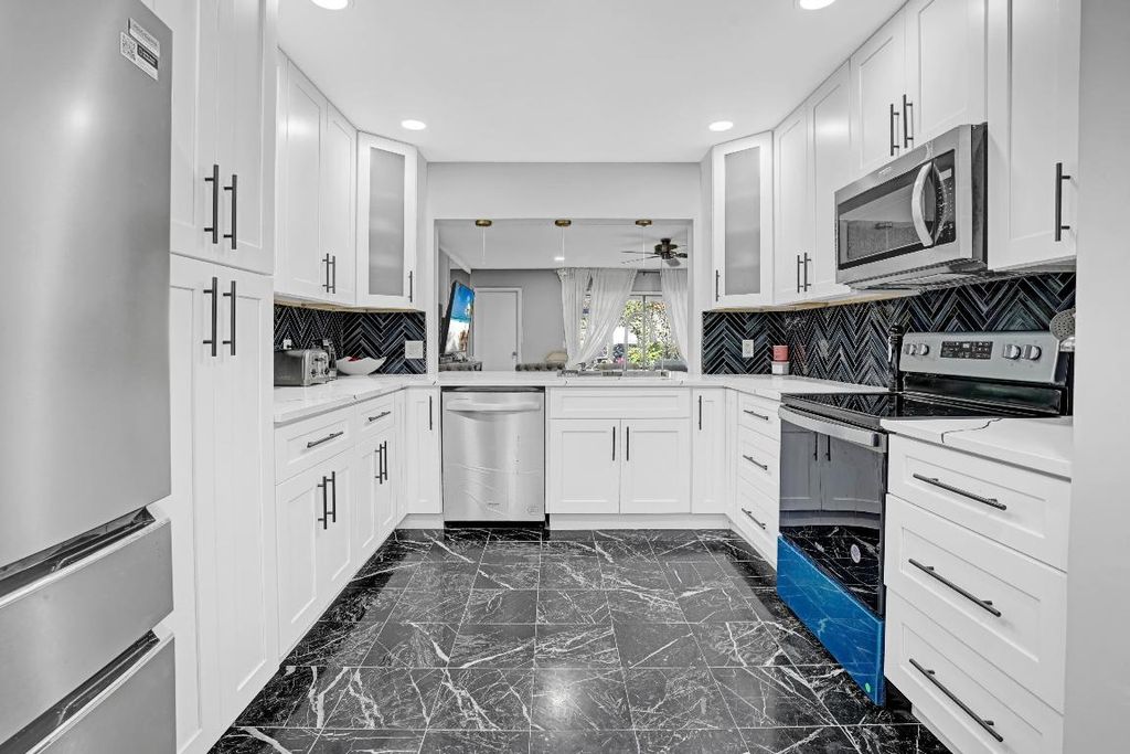 Photo of 2070 Colonial Road #D4, Fort Pierce, FL 34950 (MLS # R11136990)