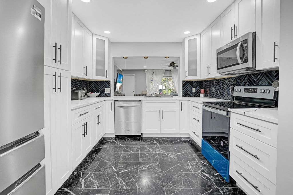 Photo of 2070 Colonial Road #D4, Fort Pierce, FL 34950 (MLS # R11136990)