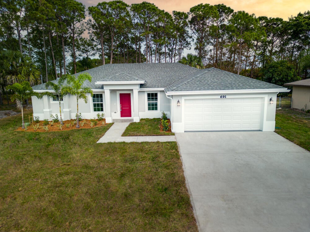 Photo of 174 SW Voltair Terrace, Port Saint Lucie, FL 34984 (MLS # R10938305)