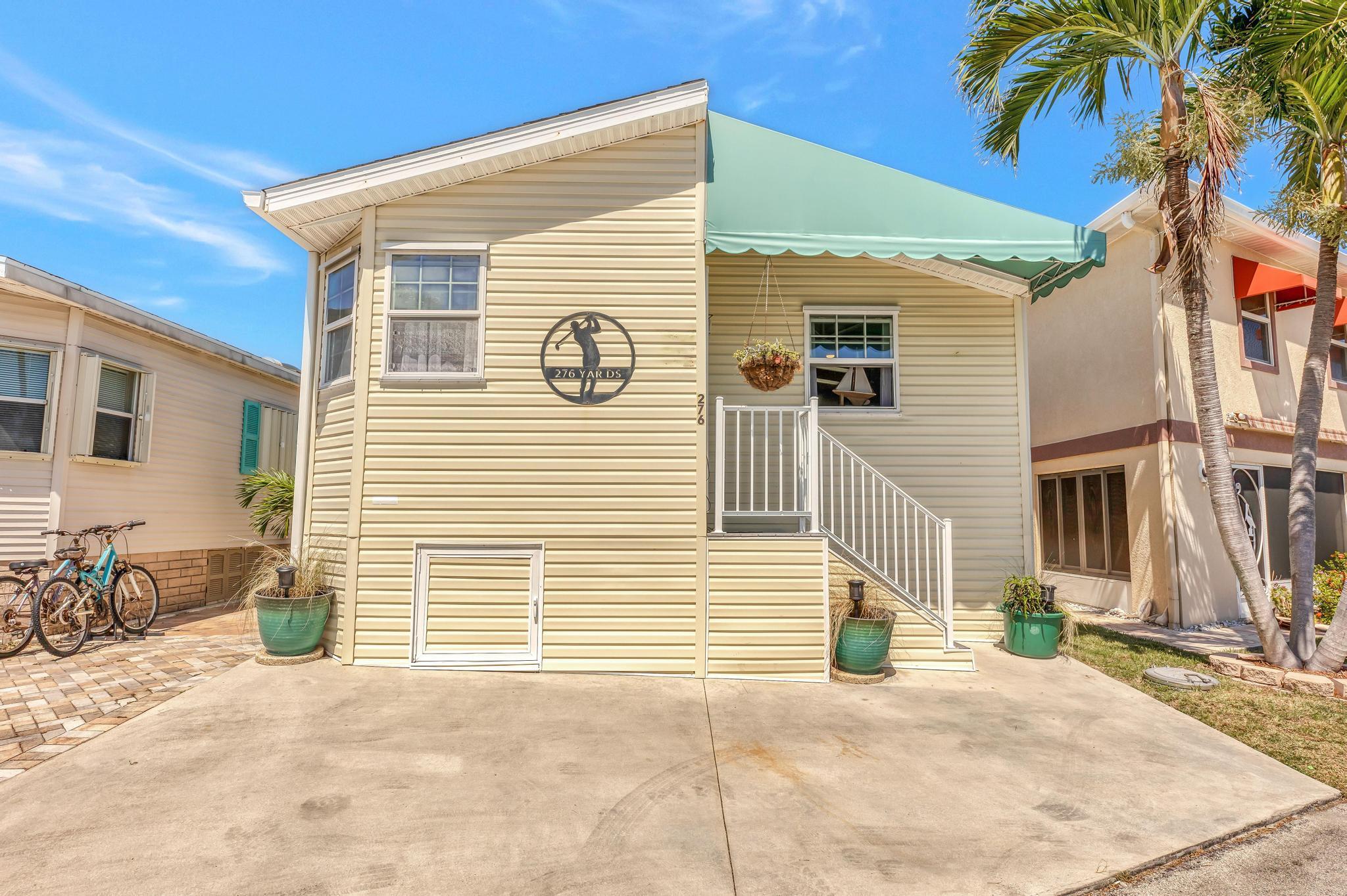 Experience the best of coastal living in this beautifully maintained 2-bedroom, 2-bath home in the sought-after Holiday Out community. Featuring a bright, open layout with abundant natural light, this home offers a warm and inviting atmosphere perfect for both everyday comfort and entertaining. Located just steps from your own private beach access, it's ideal as a full-time residence or a serene vacation escape. Take advantage of resort-style amenities including an oceanfront clubhouse, heated pool, pickleball, bocce ball, shuffleboard, billiards, and outdoor grilling areas. Embrace the Florida lifestyle you've been dreaming of!