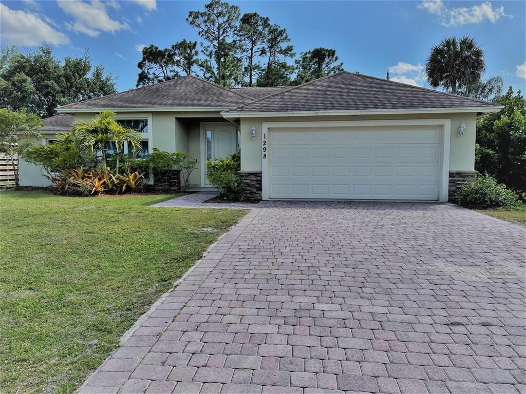 Photo of 1298 SW Porter Road Rd, Port St Lucie, FL 34953 (MLS # R10701510)