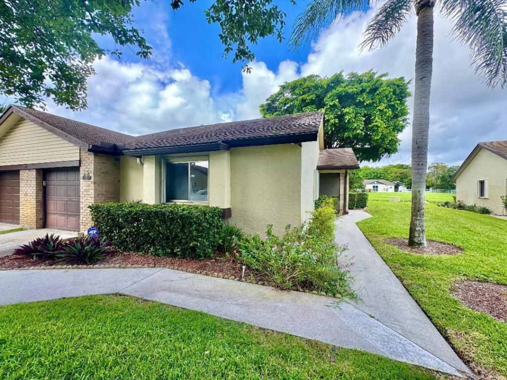 Photo of 116 Village Walk Drive, Royal Palm Beach, FL 33411 (MLS # R11150268)
