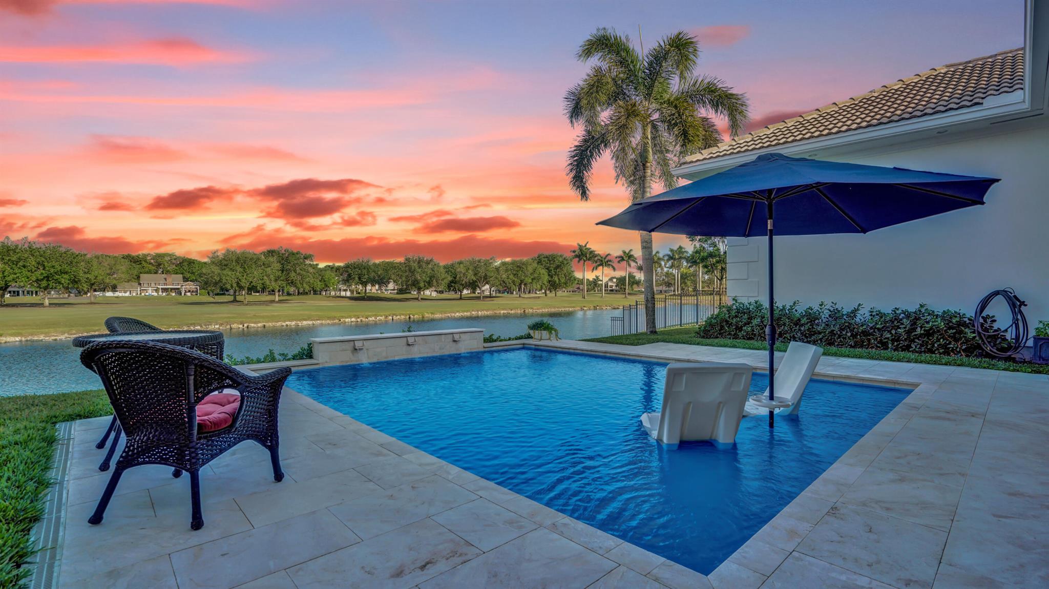 This home has everything you could ask for! From high-end appliances and impact windows to an oversized covered patio. Come see this exceptional new listing in the highly sought-after Lago Mar Colony neighborhood! This stunning 4-bedroom, 4.5-bath home spans over 5,000 square feet, offering breathtaking golf course and water views. The home features generously sized bedrooms, each with its own en-suite bathroom and extra-large closets. Additional highlights include a newly heated pool and a custom-designed sundeck, perfect for soaking up the Florida sunshine. Love golf, tennis, or pickleball? The Lago Mar Country Club offers optional Golf and Social memberships, making this the ultimate lifestyle destination. Don't miss your chance to call Lago Mar Colony home, where luxury, convenience