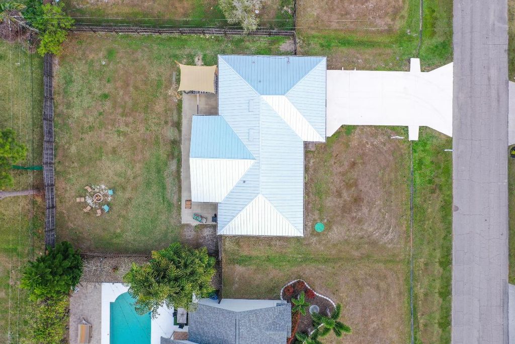 Photo of 407 SW Molloy Street, Port Saint Lucie, FL 34984 (MLS # R11152322)