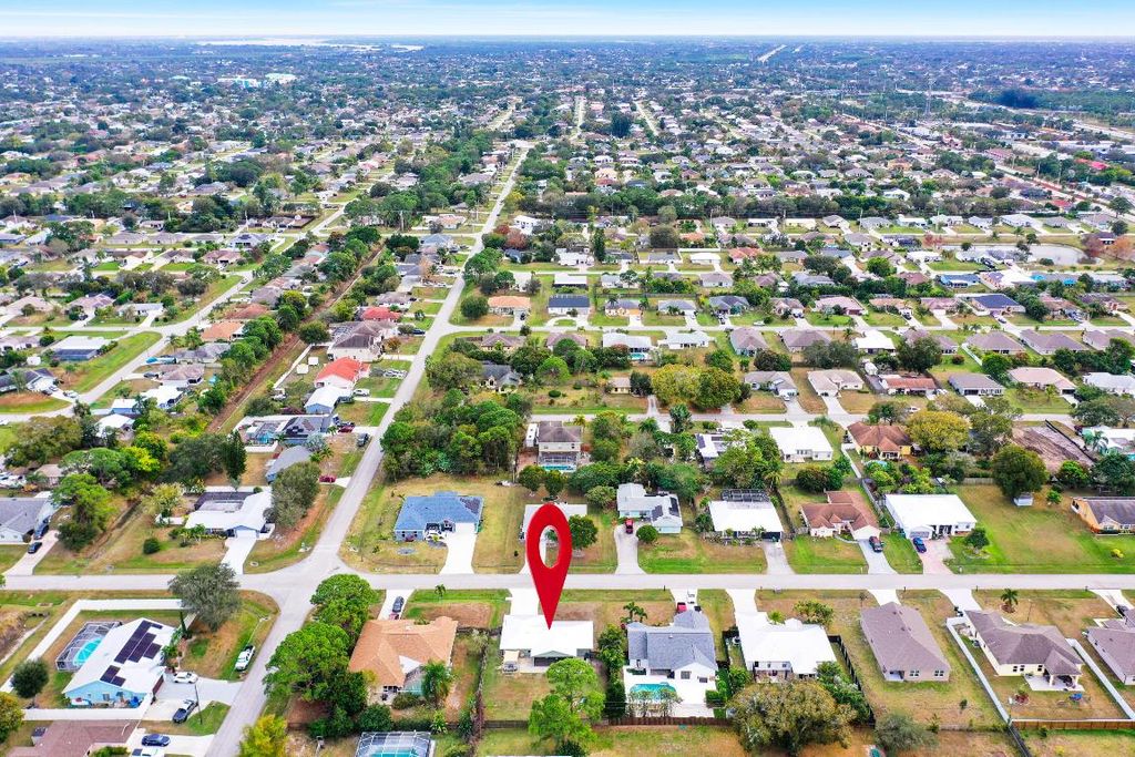 Photo of 407 SW Molloy Street, Port Saint Lucie, FL 34984 (MLS # R11152322)