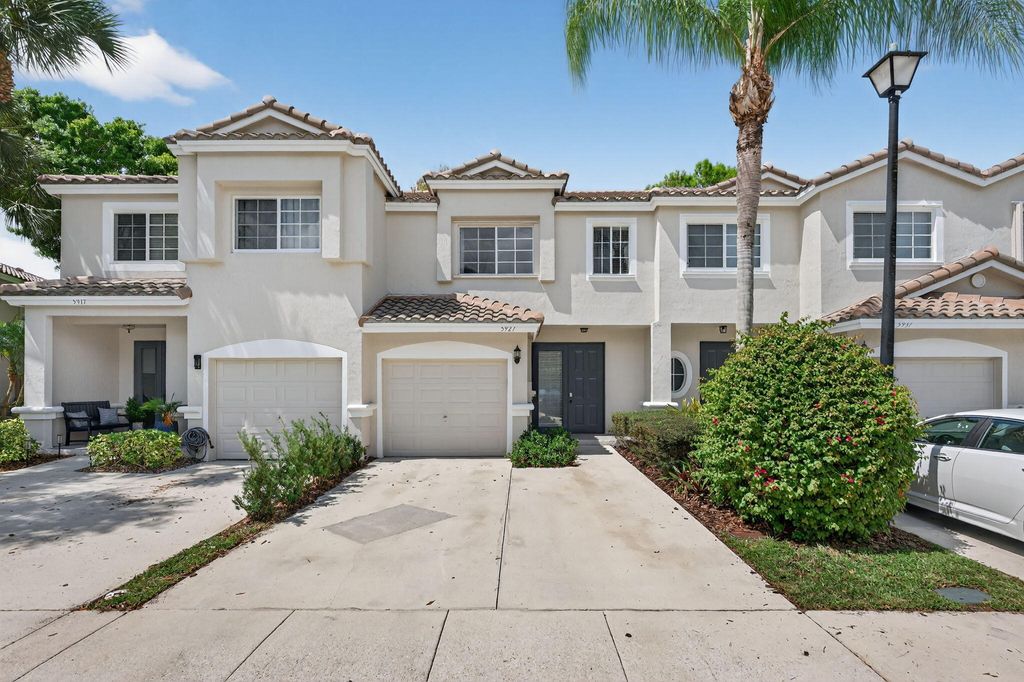 Photo of 5927 NW 47th Way, Coconut Creek, FL 33073 (MLS # B26000807)