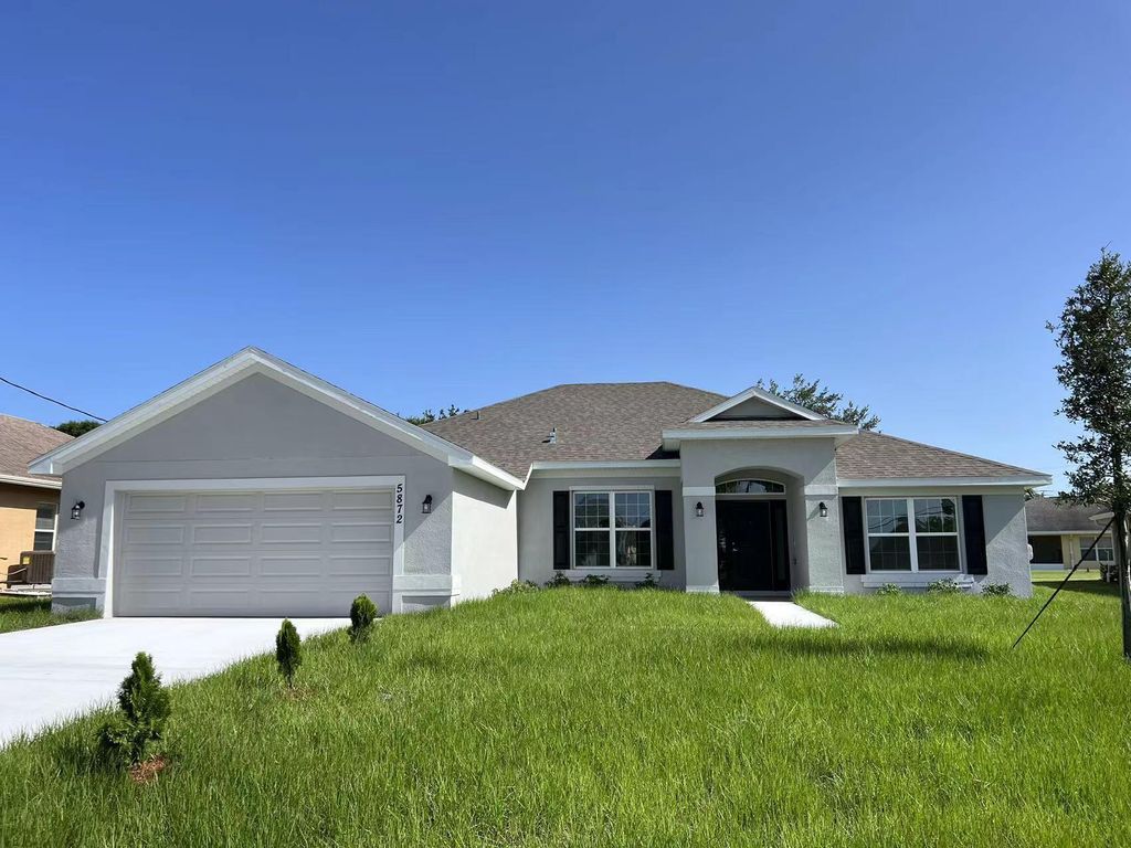 Photo of 5872 NW Croso Avenue, Port St Lucie, FL 34986 (MLS # R10907485)