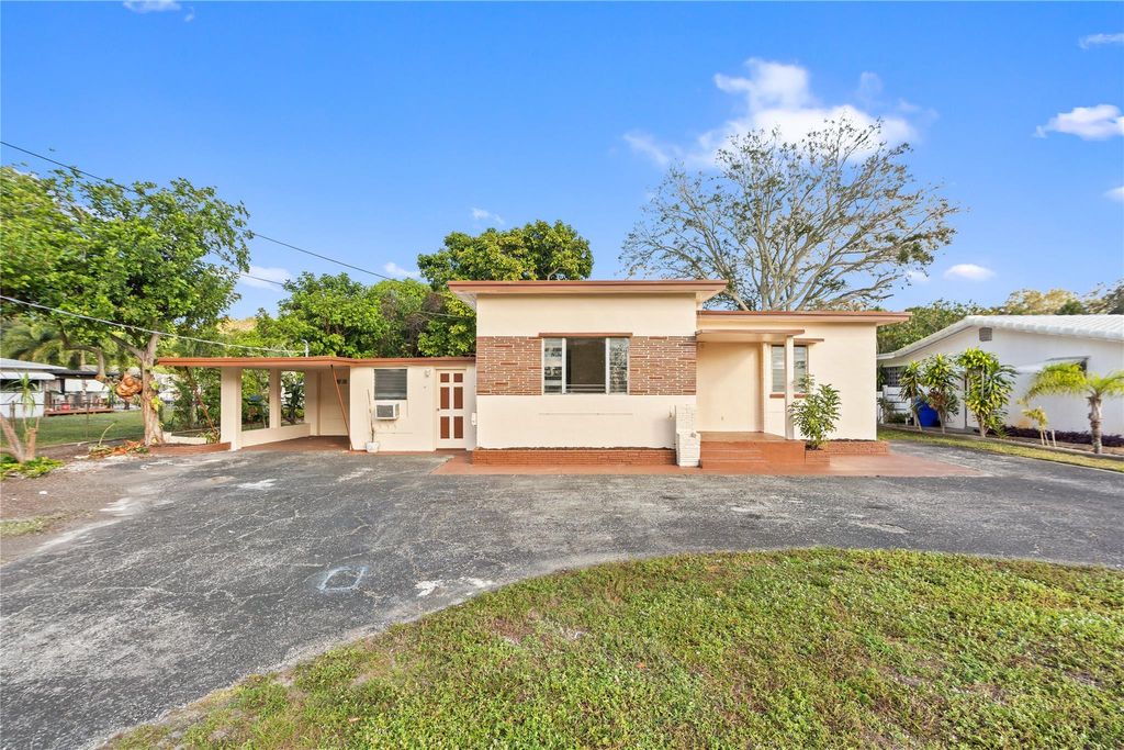 Photo of 5705 Harding St, Hollywood, FL 33021 (MLS # F10540235)