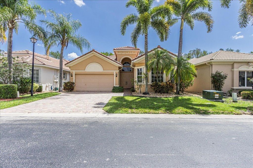 Photo of 10126 Armani Drive, Boynton Beach, FL 33437 (MLS # B26022050)
