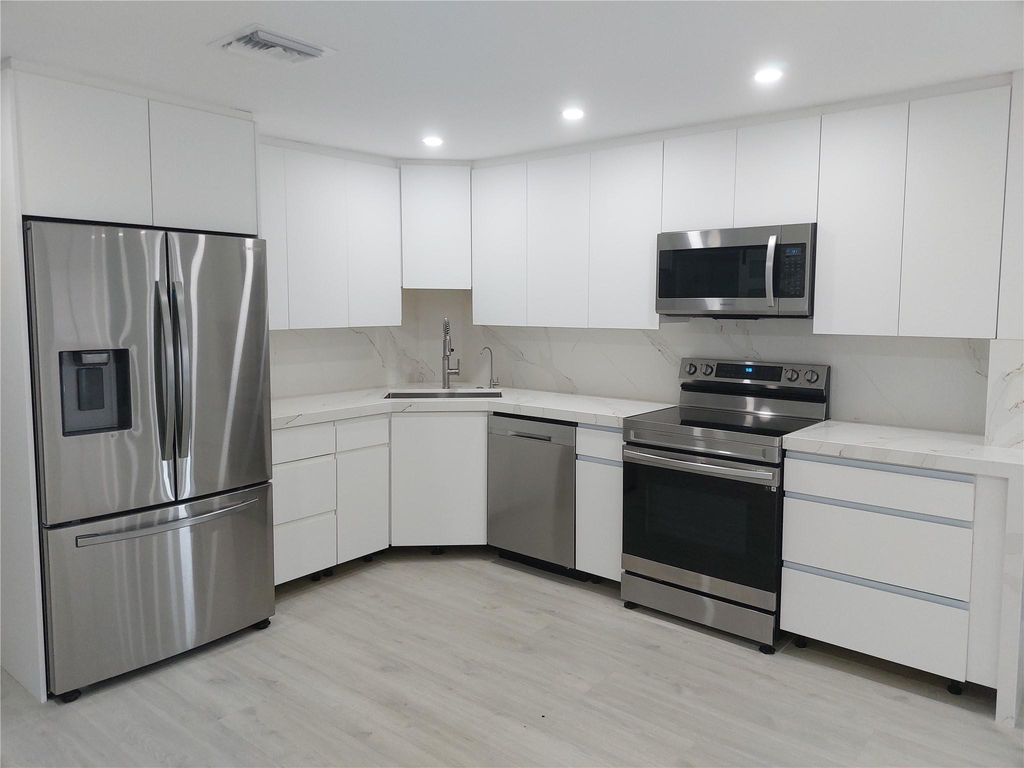 Photo of 2115 NE 37th Drive #235, Fort Lauderdale, FL 33308 (MLS # F10482731)