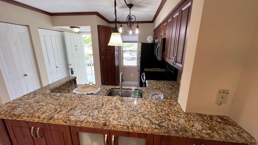 Photo of 2236 N Cypress Bend Drive #308, Pompano Beach, FL 33069 (MLS # F10464524)