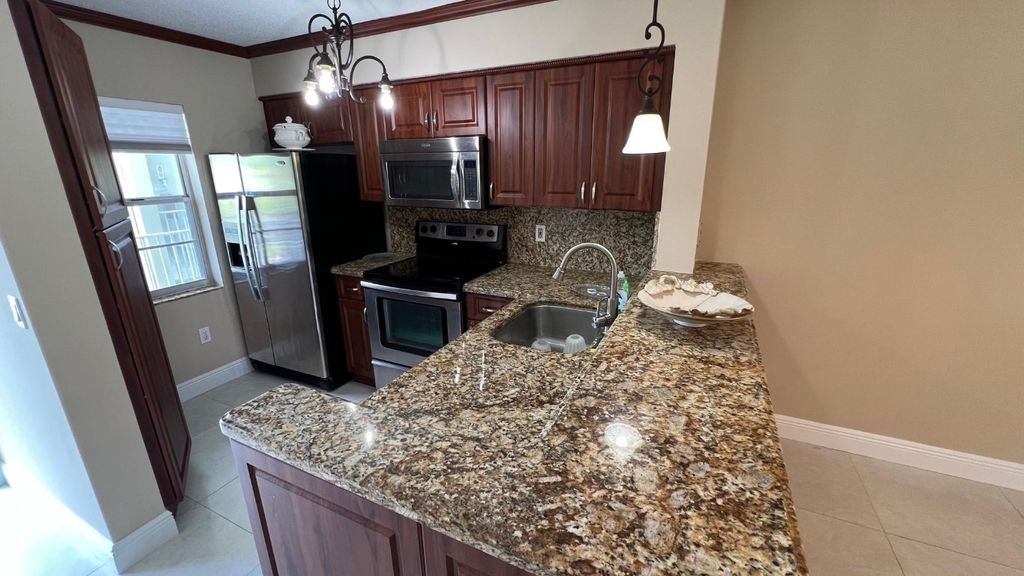 Photo of 2236 N Cypress Bend Drive #308, Pompano Beach, FL 33069 (MLS # F10464524)