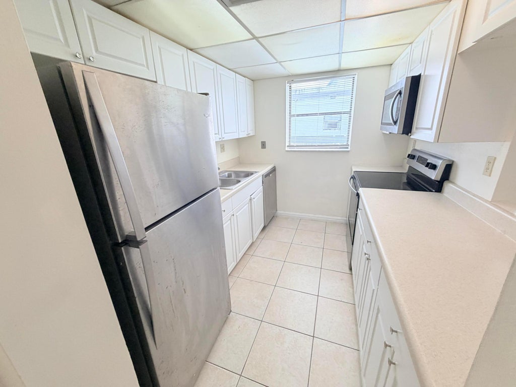 Photo of 1950 N CONGRESS Avenue #403, West Palm Beach, FL 33401 (MLS # B26077469)