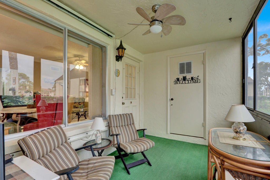 Photo of 338 Knotty Pine Circle #D-1, Greenacres, FL 33463 (MLS # B26080066)