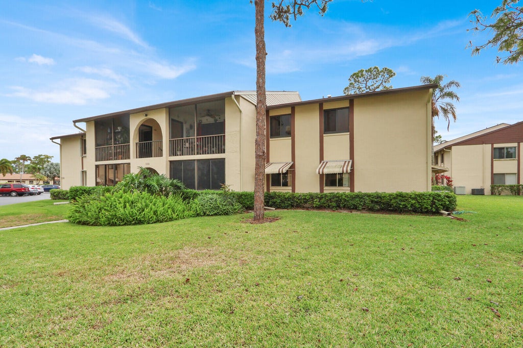 Photo of 338 Knotty Pine Circle #D-1, Greenacres, FL 33463 (MLS # B26080066)