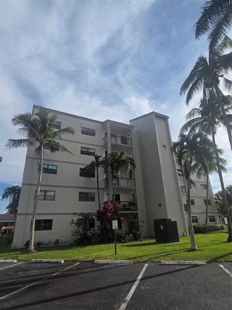 This lovely corner unit features an abundance of natural light and an open concept floor plan. The airy open layout allows for a seamless flow between the living and dining areas, highlighting the property's natural light, throughout the home. Nicely designed and updated bathrooms. The kitchen boasts granite countertops complemented by ample cabinetry for generous storage and a window. Plenty of closets in the unit. Tiles floors through out, nice tiled balcony with green treetop views. Amazing garden view from the terrace. The complex offer amenities like, heated pool, bbq area, tennis court, car wash and plenty of green areas, parking assigned right in front of the building. All new washer/ dryer/ laundry rooms at each floor. Inspection passed, healthy financials and no assessments coming