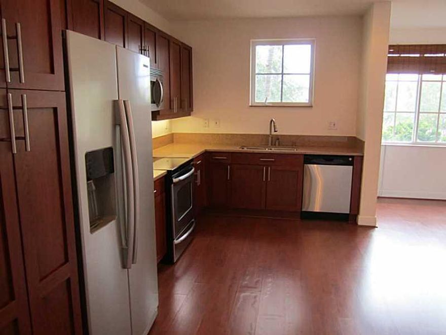 Beautiful 3 BR/2.5 Bath.5 THE VILLAGE AT SAILBOAT BEND.  Three  story townhouse  next to  Preserve Park.This spacious and bright Townhome was built in 2005 and includes an open kitchen with stainless steel appliances, granite counter tops, Freshly Painted  and with new carpet.  Butler's Pantry and wine cooler, built-in media center, two balconies, washer and dryer.With built in closets the master bedroom with  Jacuzzi In downtown near los Olas. Only First and Security required with Excellent Credit