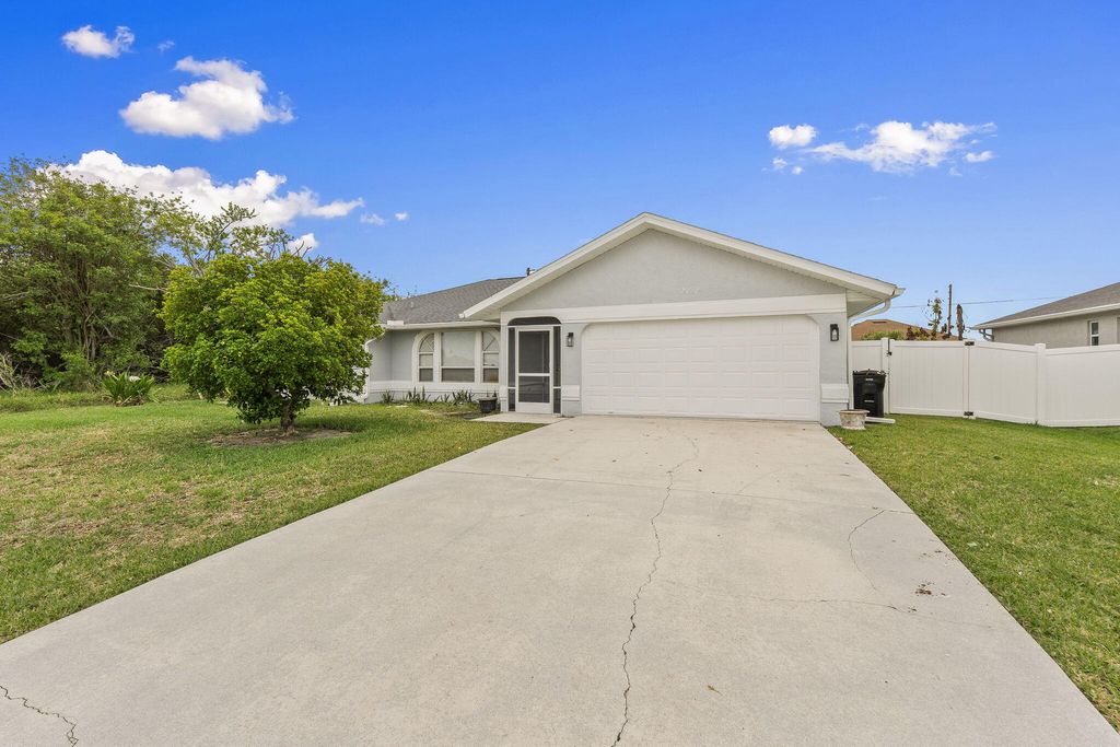 Photo of 2452 SW Fair Isle Road, Port Saint Lucie, FL 34987 (MLS # B26012967)