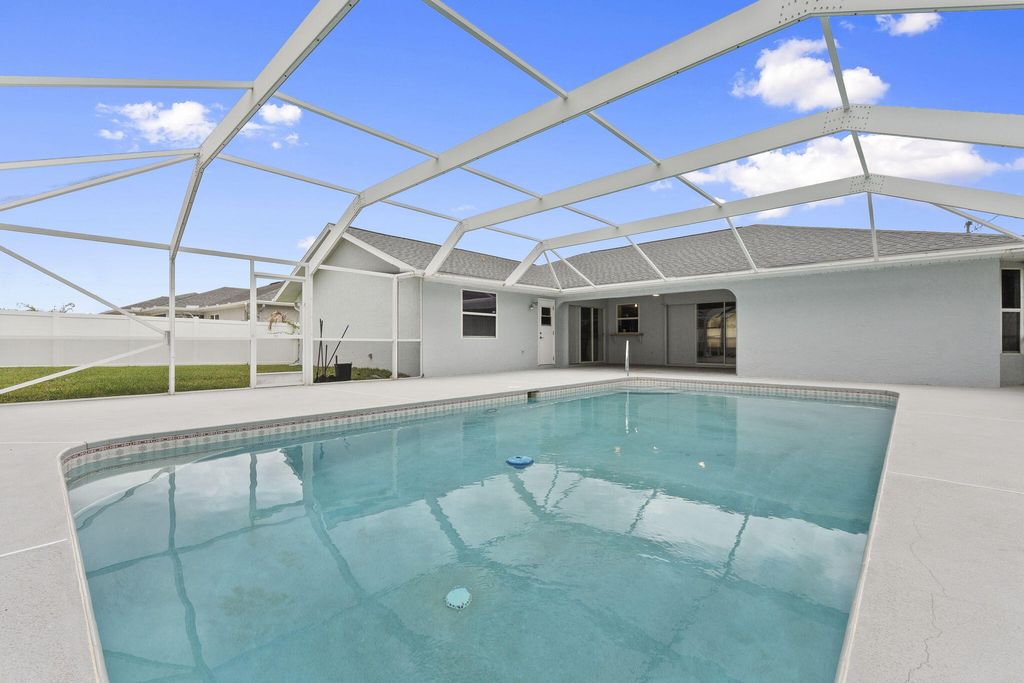 Photo of 2452 SW Fair Isle Road, Port Saint Lucie, FL 34987 (MLS # B26012967)