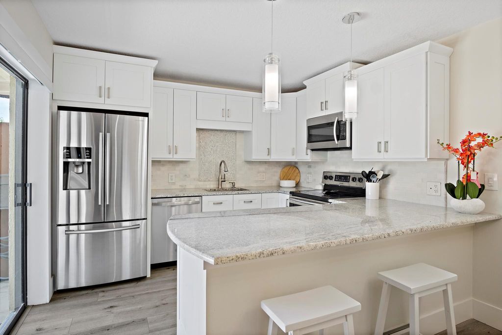 Photo of 6165 SE Riverboat Drive #1019, Stuart, FL 34997 (MLS # R11106234)