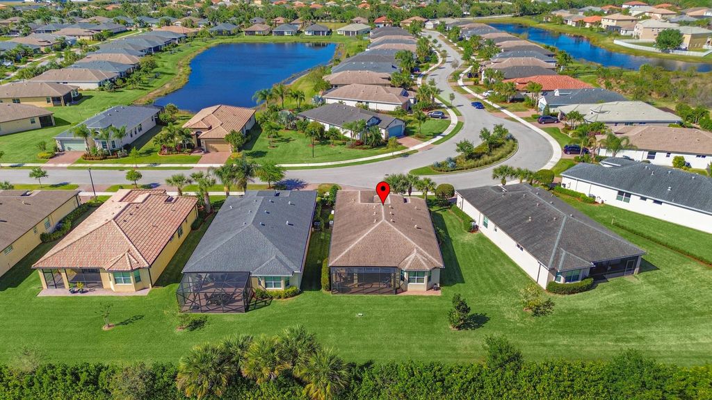 Photo of 11367 SW Lake Park Drive, Port Saint Lucie, FL 34987 (MLS # R10925090)