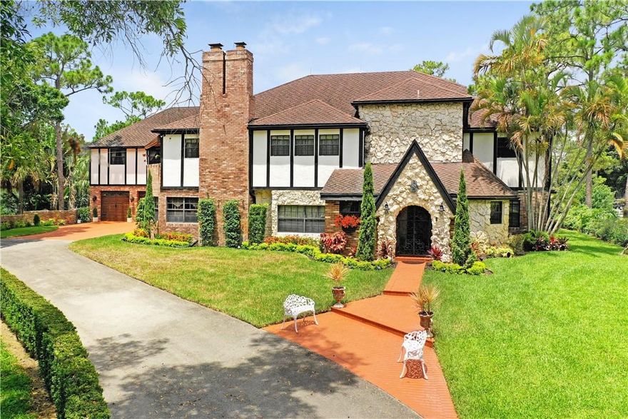 Magnificent English Tudor style home, 5-bedroom main House w/ spacious separate-entrance for Guests
Enjoy your morning coffee in spacious 3,000+ sq. ft screened enclosed Patio with built-in Pool, overlooking the gazebo & tennis Courts, Master Bedroom w/ brick fireplace & Balcony overlooking the south grounds.
Guest quarters boast 1,100 sq. feet of seclusion separated from the main House by the Tower/Parlor area.  Featuring its own entrance with an inlaid wooden staircase, Kitchen, Bedrooms, large Living Room w/ balcony overlooking Rose Garden, Gazebo, Tennis Courts & Horse Quarters.
The spacious 1,100 sq. feet 3 car Garage is a handyman's dream with an adjacent workstation area.  
Large air-conditioned Barn/Workshop/Game-room w/built-in counters & cabinets for work or entertaining.