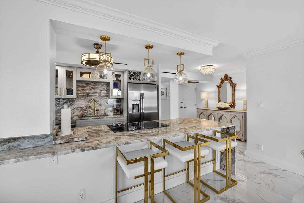 Photo of 5510 N OCEAN Drive #7B, Singer Island, FL 33404 (MLS # B26067245)