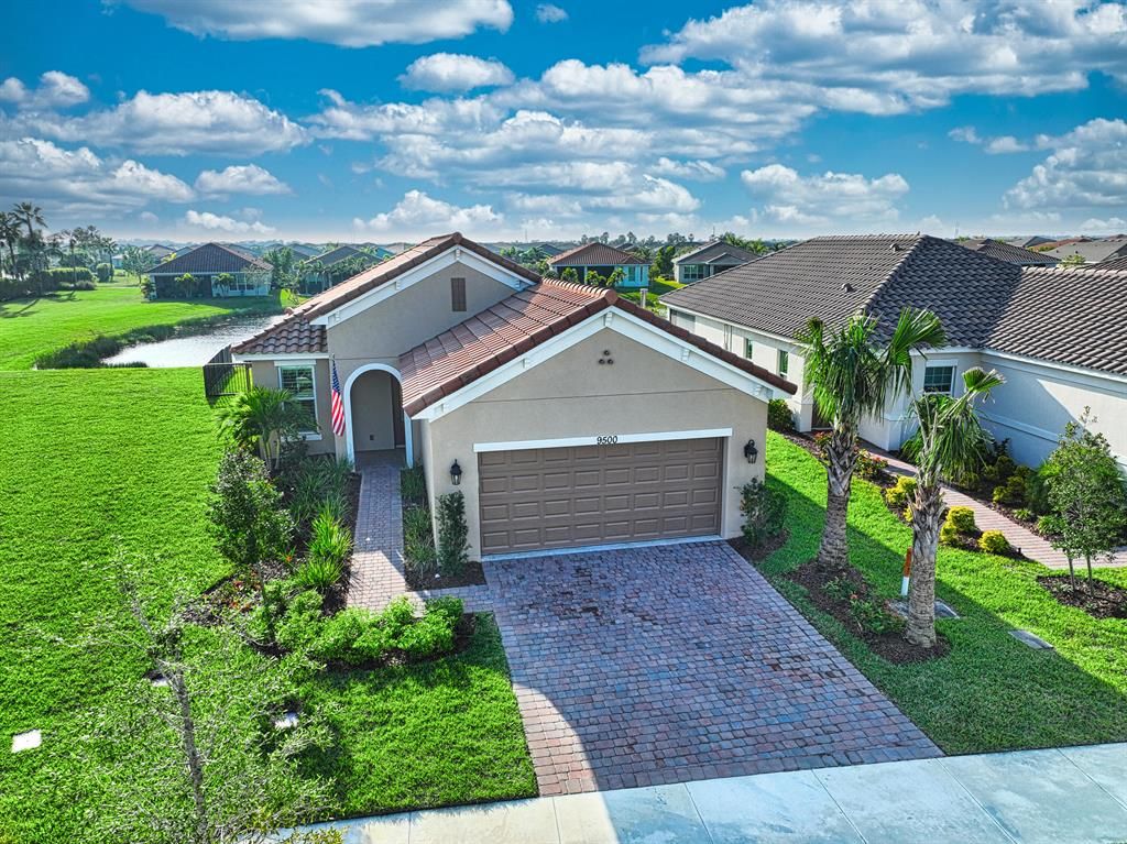 Photo of 9500 SW Royal Poinciana Drive, Port Saint Lucie, FL 34987 (MLS # R10852080)