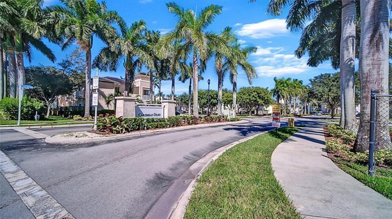 Highly sought after, Beautifully remodeled 1st floor 3 bedroom in gated community of Caribbean Isles. Spacious layout, open kitchen with all the upgrades! Luxurious clubhouse with amazing amenities! Call today to tour the property!