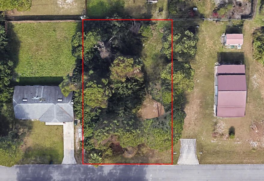 Build now or hold for future appreciation in desirable SW Palm Bay. This residential lot offers paved road access and is just minutes from Bayside Lakes shopping, dining, schools, and Fred Poppe Regional Park. Convenient access to Malabar Rd, Minton, and I-95, with beaches approximately 25-30 minutes away. No HOA and strong new construction activity nearby make this a great opportunity for builders, investors, or future homeowners.